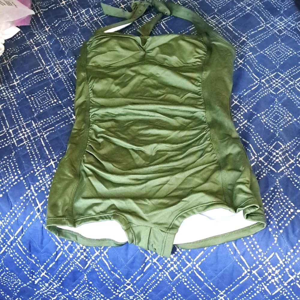 Nwt in bag NWT olive green one piece  med beautiful rushing